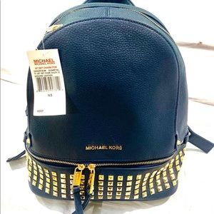 New with tags. Blue Michael Kors book bag.
